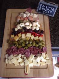 The most delicious appetizer spread is for starters. Year 2 Of My Christmas Antipasto Tree Italian Food Appetizers Holiday Food Cheese Christmas Food Christmas Eve Dinner Christmas Dinner
