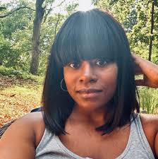 Was Billie Holiday a contralto or alto singer?