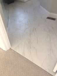 Ceramic tiles measuring 12 by 24 inches can be installed on either floors or walls. Florentine 12 215 24 Carrara Fl06 Install Brick Jo 12x24 Bathroomd Brick Carrara Doorway Carrara Tile Bathroom Marble Tile Bathroom Marble Bathroom Floor