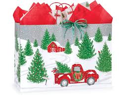 Reindeer child sitting in christmas red hat with red scarf. Tree Farm Red Truck Paper Shopping Bags Vogue 16x6x12 250 Pack Nashville Wraps