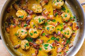 Lower the heat to medium and allow the scallops to brown lightly on 1 side without moving them, then turn and brown lightly on the other side. Bacon Scallops With Lemon Butter Sauce Julia S Album