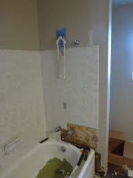 Take the razor blade and carefully pry the old caulking off the tub. How To Replace A Bathtub Step By Step Installation Guide Dengarden