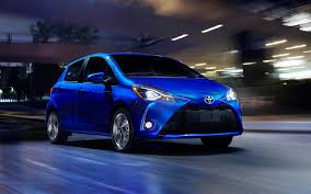 トヨタ・ヤリス, toyota yarisu) is a supermini/subcompact car sold by toyota since 1999, replacing the starlet and tercel. Download Wallpapers Toyota Yaris 2018 Cars Night Headlights Road Blue Yaris Japanese Cars Toyota Besthqwallpapers Com Best Mpg Cars Yaris Toyota