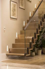 Pale Walls And Artwork Were Specially Selected So As Not To Detract From The Incredible Floating Staircas House Interior Decor Staircase Design Wood Staircase