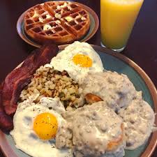 Homemade Eggs Bacon Potatoes O Brien Biscuits And Sausage Gravy Waffle And Oj Homemade Breakfast Food Food Cravings