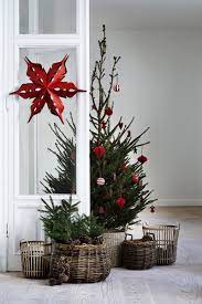 Download this free psd file about scandinavian christmas decorations, and discover more than 14 million professional graphic resources on freepik. Cozy Christmas Decor In Wicker Red And Green Minimalist Christmas Tree Scandinavian Christmas Trees Minimalist Christmas