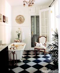 An upholstered chair, antique candlesticks, and a gilded mirror over the fireplace add some french glam. 23 French Country Bathroom Decor Ideas For Your Home