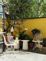 This patio side table is this beautiful round side table also features a glass top, which is ideal for holding a floral centerpiece and more. Vitra Metal Side Table Outdoor Large H 35 5 X B 70 X T 31 5 Cm Ice Grey By Ronan Erwan Bouroullec 2004 Designer Furniture By Smow Com
