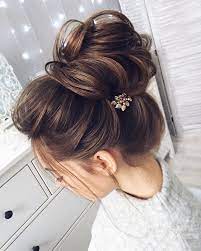 But, to be able to rock an updo, you have to have long hair. Chic Messy Bun For Straight Hair Long Hair Styles Medium Hair Styles Long Hair Images