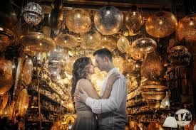 While walking around the attractions professional wedding photographer made several family portraits, since the brides came to europe with their parents. Marrakesh Engagement Photographer Morocco Destination Photo Shoot