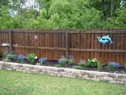 Raised Flower Bed This Would Look So Much Better Than Our Back Bed Does With Railroad Ties Outdoor Garden Decor Raised Garden Backyard Fences