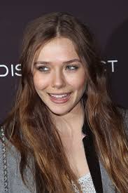 Actress says that reboot film is definitely not elizabeth olsen has confirmed her godzilla involvement. Elizabeth Olsen Calls Godzilla Aaron Taylor Johnson S Movie