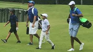 Wearing the same sunday red shirts. Tiger Woods Son Charlie Dominates Nine Hole Golf Tournament With His Dad As Caddy Cbssports Com