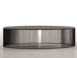 Uncompromisingly finished metal framework is complemented by refined glass table top surfaces. Oval Metal Coffee Table With Glass Top Andra By Tonin Casa