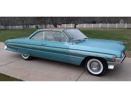 Image result for Fawn Mist 1961 Oldsmobile