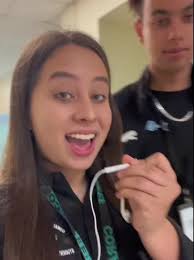 Coral High School Teacher with Student