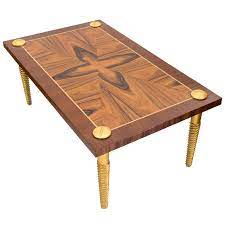 Circular marquetry inlaid top raised on a baluster turned support resting on a tripod base with this italian round walnut veneered coffee table top is decorated with parquetry, thin layers of walnut. Midcentury Modern Marquetry Coffee Table With Giltwood Screw Legs At 1stdibs