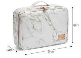This beauty case works as a makeup bag or travel organizer, the perfect piece to carry on light contrast. Large Cosmetic Travel Case White Marble Etoile Collective