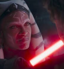 I've rewatched this scene multiple times and her eyes do briefly turn  yellow. It's not just saber glow. Let's not forget, Ahsoka isn't a Jedi  anymore. But she's not Sith either. She