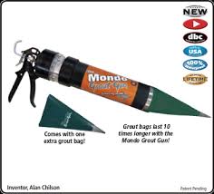 Use an old toothbrush to scrub away in the grout until it is clean. Mondo Grout Gun Fastcap