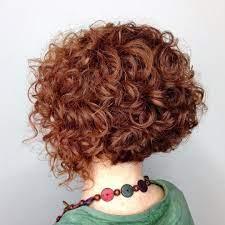 Long curly + curtained hair. 29 Short Curly Hairstyles To Enhance Your Face Shape