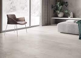 The hardness of a ceramic tile floor may be an issue in a home where there are small children or elderly people susceptible to falls. Living Room Porcelain Stoneware Marble Stone Wood Look Tiles