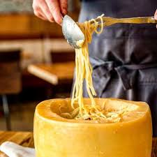 Fighetti When Your Spaghetti Is Served From A Giant Melted Parmesan Cheese Wheel And You Know You Have Fou Cheese Wheel Cheese Wheel Pasta Dinner Restaurants