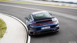 Its lines clearly draw from the model it replaces, albeit. 2021 Porsche 911 Turbo S Coupe Color Gentian Blue Metallic Rear Hd Wallpaper 165