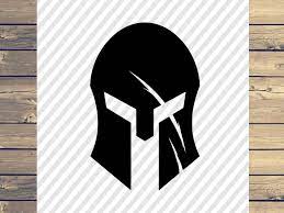 Spartan Helmet With Scar Svg Filespartan Helmet With Scar Etsy In 2021 Spartan Helmet Spartan Helmet Tattoo Spartan