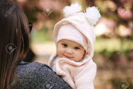 So i set out to turn an indoor table into an outdoor table. Portrait Of Cute Little Baby Girl Outside With Mom Beautiful Stock Photo Picture And Royalty Free Image Image 122384178