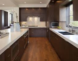 These staining techniques give the impression of weathered wood but use a sturdier material, like oak or birch. Modern Walnut 4 Walnut Kitchen Kitchen Design Modern Walnut Kitchen