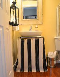 A sink skirt is often used to cover exposed plumbing or unsightly storage space. Painted Pedestal Sink Skirt Shower Curtain Down To Earth Style