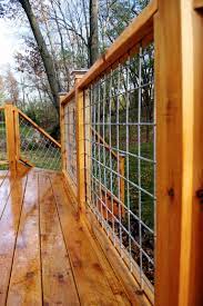 Hog Wire Fencing Allowed This Deck To Flow Into The Rest Of Space Creating The Sense Of A Boundary With Wire Deck Railing Deck Railings Outdoor Stair Railing