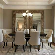 It has a rustic farmhouse appeal and looks great with any decor. How To Decorate Your Home With Mirrors In Some Stunning Ways World Inside Pictures Mirror Dining Room Dining Room Wall Decor Luxury Dining Room