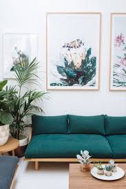 Teal Sofa Bright White Walls Bohemian Style Home Decor Green Plants And Light Wood Minimalist Living Room Home Decor Room Decor