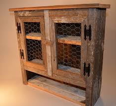 You can also add crown molding over your cabinets and kitchen customization does not always need to be costly. Barn Wood Chicken Wire 2 Door Cabinet 110 00 Farmhouse Home Decor Furniture Gifts Enchanted Farmhouse For Home Decor