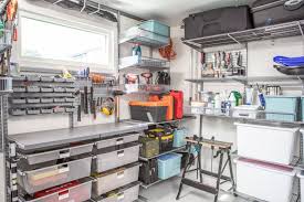 Shelves, plastic tubs, a closet, and a workbench! 10 Diy Garage Storage Ideas To Get Your Space Organized Real Homes