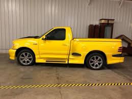 Image result for Federal Safety Yellow 2002 Truck