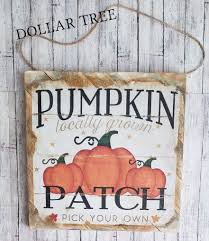 A Dollar Tree Calendar Page Turns Into A Rustic Farmhouse Pumpkin Sign In 2020 Calendar Craft Dollar Tree Crafts Dollar Tree Diy Crafts