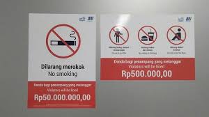 Ini aturan larangan merokok saat berkendara, kena denda rp 750.000. Denda Makanan Tanda Larangan Merokok
