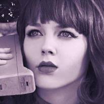 You didn't get to meet Elise yesterday, but here are a couple of pictures.  Elise has the most glorious red hair.