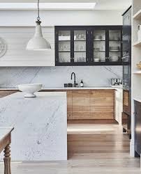 Super smooth surfaces run from walls to cabinets to countertops and the texture even flows to the clear plastic stool tops. The 2019 Modern Farmhouse Becki Owens Shaker Style Kitchens Modern Farmhouse Kitchens Minimalist Kitchen