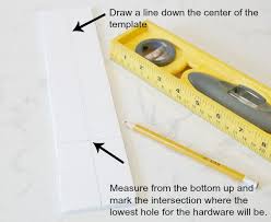Ikea sells a drill template that looked promising, but their metric system made every hole off by a 1/16. Diy Cabinet Hardware Template Hardware Installation Made Easy