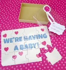 When making a facebook announcement, share all the information that you would put on a classic birth announcement, including the baby's name, birth date, and gender. An Easy Creative Pregnancy Announcement Puzzle