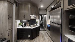 Each road warrior toy hauler model comes with beautiful bordeaux cabinetry throughout, a washer/dryer prep in all models, brushed nickel hardware and fixtures here at fun town rv houston you will find great prices and a great selection of heartland road warrior toy haulers for sale. Road Warrior Heartland Rvs