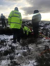 man rescued after sinking waist deep