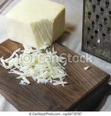 The mandoline works best with firmer cheeses such as cheddar, monetary jack and mozzarella. Grated Cheese With Grater And Knife Close Up Canstock