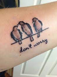 Three Little Birds Tattoo Bob Marley Tattoo Love The Simple Wording Little Bird Tattoos Birds Tattoo Bob Marley Tattoo