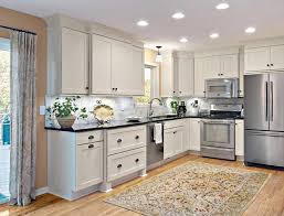 The cabinets are classic shaker style with a beaded inset, which works with the period of the home. The Timeless Allure Of A Black White Kitchen Kitchen Trends