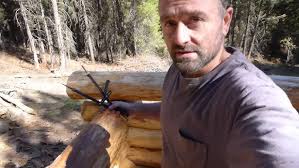 How to Build a Log Cabin: Cutting the Saddles for your Full Scribe Log Home  #cabinbuild #logbuilding